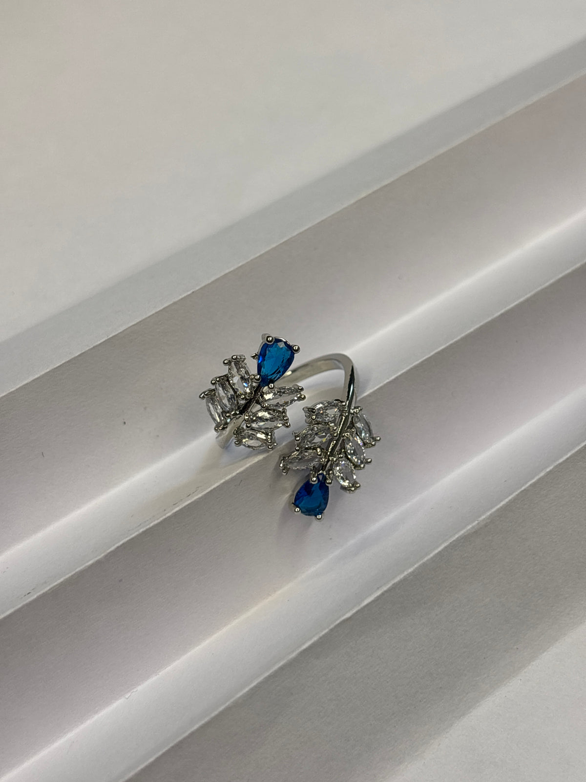 Arctic Blue Asymmetric Cluster Ring